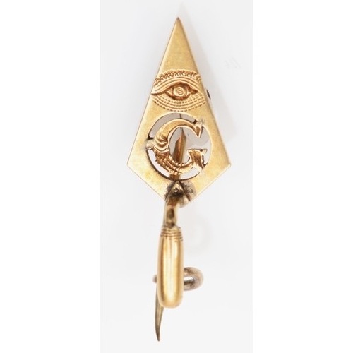 143 - A rare Victorian unmarked gold Masonic trowel brooch, with pierced G and engraved all seeing eye abo... 