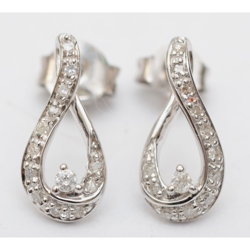 148 - A 9ct white gold, brilliant and single cut diamond pair of earrings, 14mm, 1gm