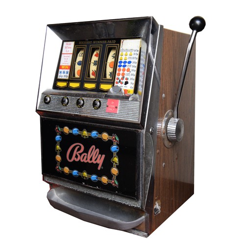 400 - Bally, an electromechanical three reel and hold slot machine, c.1965/70, 48 x 46 x 67cm, 2p play.
Pr... 