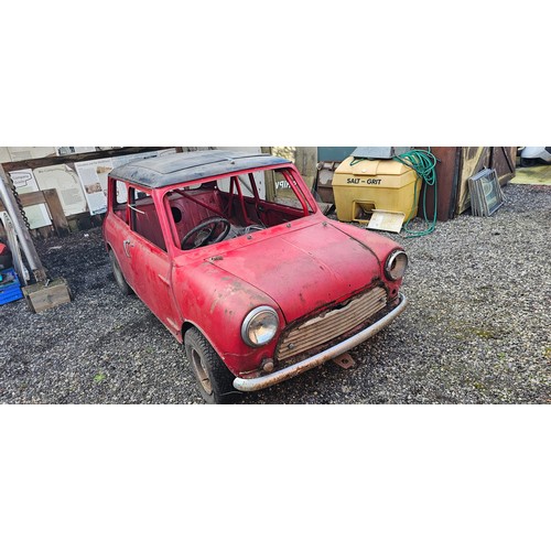 1965 Austin Mini Cooper Mk 1, 988cc. Registration number JPX 194D. Chassis number C-A237/810529 (see text). Engine number 9FD-SA-H12321.
Sold with the V5C, V5, Heritage Certificate dated 08/02/2024, 1992 receipt for engine parts to the tune of £294 from Jonspeed Racing, and several early 1990's period restoration photographs, there are no keys.
The Mini Cooper was modelled as a special version of the first generation Mini, with John Cooper of the Cooper Car Company recognising the potential in creating a motorsports version of the same car. As a result the Mini Cooper and the Mini Cooper 'S' were launched in 1961 and 1963. These cars featured 998cc engines for the Cooper and 1071cc for the S type. 
JPX was built on the 1st December 1965 and dispatched to Stringer Motors in Brighton on the 5th. It was Old English White with a black roof and had a tartan red and grey with gold brocade interior, it was also fitted with a heater.  
It was owned by Andrew McClean in 1983, he sold it to our vendor in 1987. At this time it was blue and white, although it had been green and red before that. His intention was to rally the car and stripped the engine down at work and had the head planed and block rebored by Cowburns of Cleckheaton with +20 pistons and rings, new main and thrust bearings and big ends, Duplex timing gear and chains, new oil pump. He mildly smoothed the combustion chambers and opening the ports, along the lines of David Vizards book (bible), How to modify your mini.
Reassembled it was fitted to the freshly restored bodyshell. The project then stalled in 1992 and it followed him with several house moves. He has now accepted he will not finish it and it is time for a new owner to restore. There is no interior as bucket seats were to be fitted and only the rear screen remains from the glassware, there is a brake servo and twin carbs with the car plus reverse dish wheels.
It should be noted that both the V5C and V5 state the chassis to be CA237 not the correct CA2S7.
