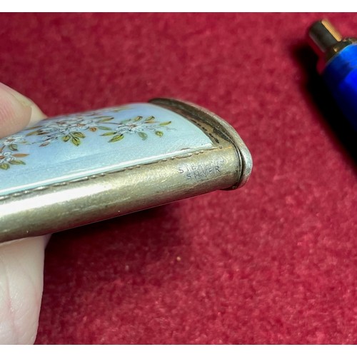 71 - A Ronson silver and enamel petrol lighter, stamped STERLING SILVER, with guilloche enamel blossom de... 