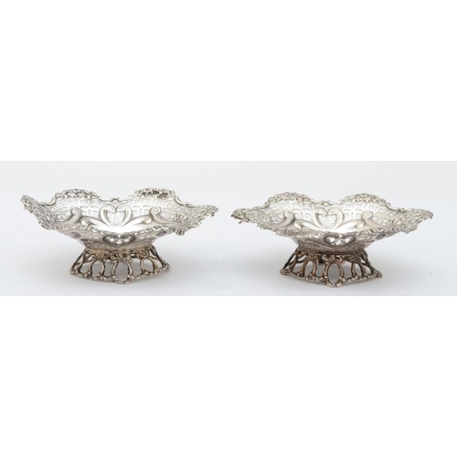 44 - A pair of Victorian bon bon dishes, by James Deakin, London 1894, with embossed floral and pierced d... 