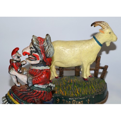 52 - A pair of 20th century painted cast iron door stops in the form of Punch and Judy, 31cm high togethe... 