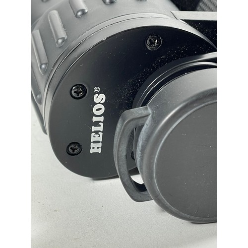 63 - A pair of Helios binoculars 15x70, incorporating long eye relief 77m at 1000m, complete with carry c... 