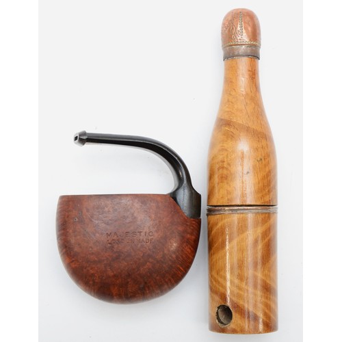 An early 20th century novelty treen champagne bottle tobacco pipe, the  copper cork inscribed Jedleui