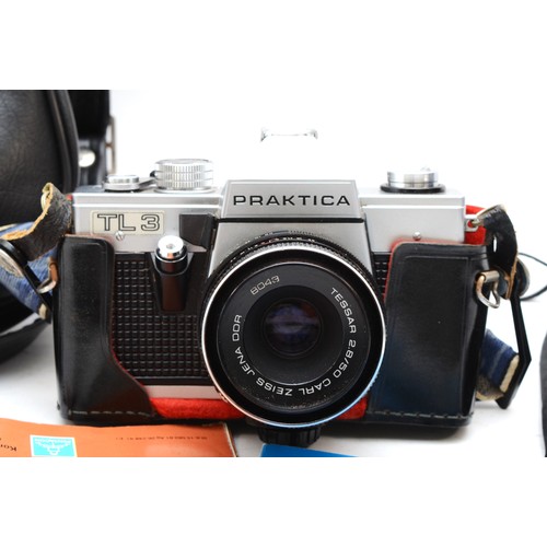 81 - A Praktica TL3 SLR camera, Tessar 2.8/50 lens, instruction booklets, hard case and Sunpak flash lamp