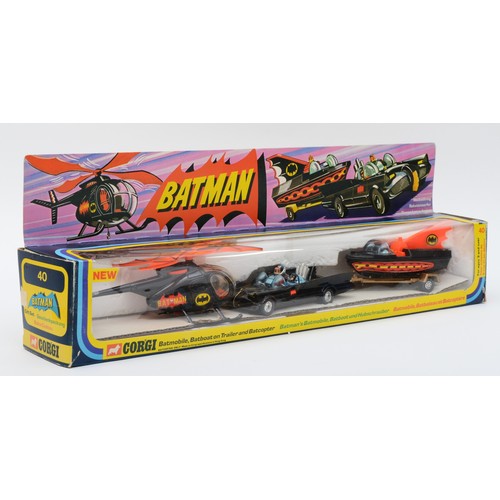 Corgi Toys; A GS40 Gift Set "Batman" 3-piece to include - Batmobile, gloss black, blue windscreens, red interior with "Batman & Robin" figures, aerial - Batcopter black body with red and black black blades, Batboat, black, orange-red fin with gold trailer and Whizzwheels, boxed.