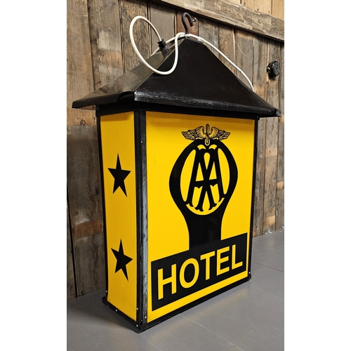 73 - An AA 2 Star Hotel plastic and metal hanging lamp, recently rewired with LED bulb, 90 x 58 x 31cm