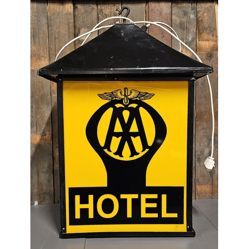 73 - An AA 2 Star Hotel plastic and metal hanging lamp, recently rewired with LED bulb, 90 x 58 x 31cm