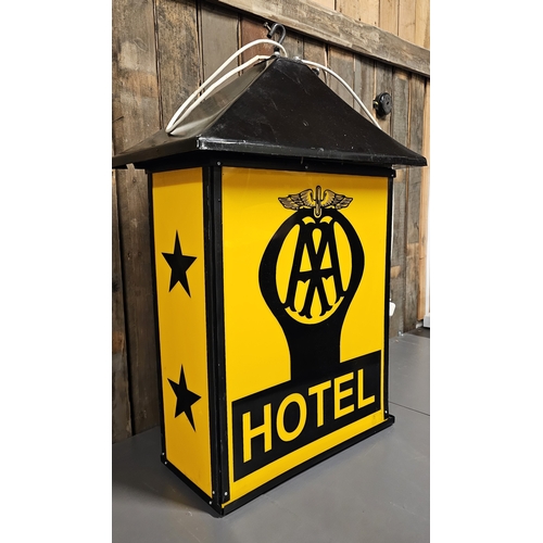 73 - An AA 2 Star Hotel plastic and metal hanging lamp, recently rewired with LED bulb, 90 x 58 x 31cm