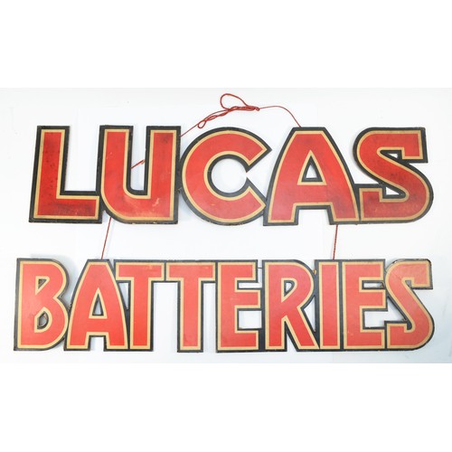 84 - Lucas Batteries, a vintage cardboard hanging display advertising sign, 70 x 38cm