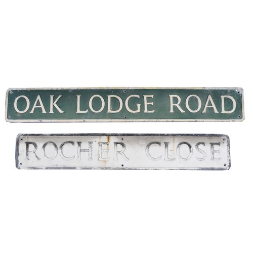 91 - Two 1950's cast aluminium street signs, Oak Lodge Road, 18 x 122cm, Rocher Close, 18 x 107cm.