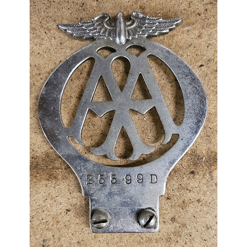 102 - A 1933 chrome AA badge, 25599D, two later examples, a motorcycle example and other badges and lights