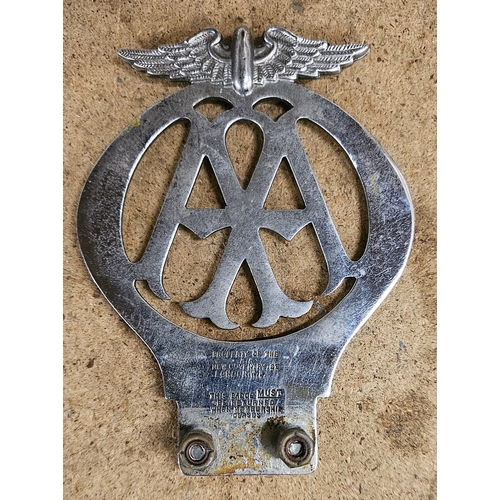 102 - A 1933 chrome AA badge, 25599D, two later examples, a motorcycle example and other badges and lights