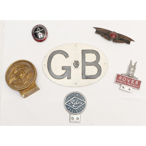 120 - A Morris Eight badge, a Rover Sports Register alloy and enamel badge, a Vintage Riley Register badge... 