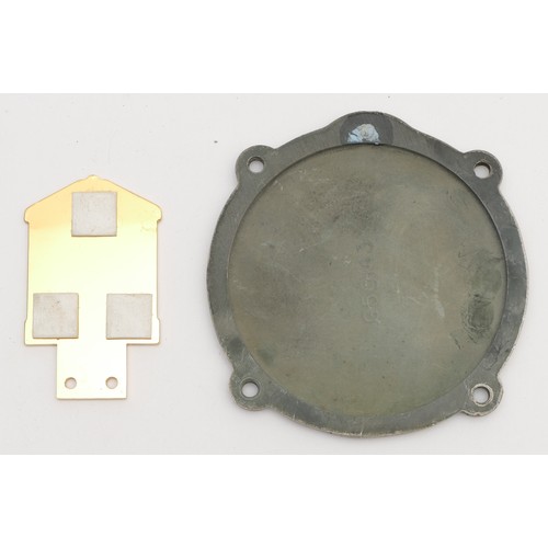 122 - A gold plated and enamel RREC grill badge and an alloy RR cover plate, part no G50143 (2)