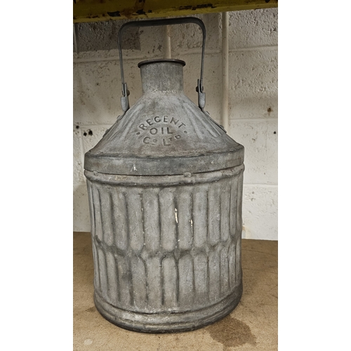 132 - A Regent Oil Co. galvanised five gallon pyramid can, 56cm with hand raised.