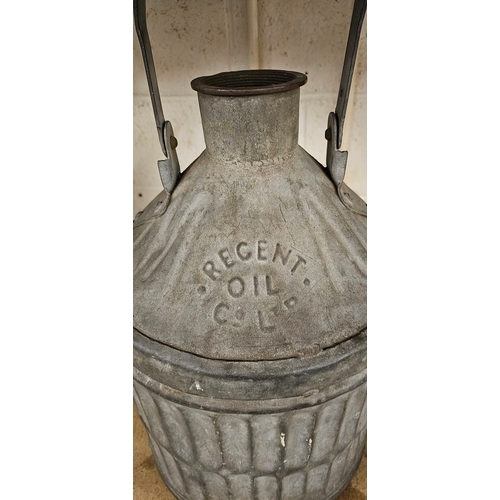 132 - A Regent Oil Co. galvanised five gallon pyramid can, 56cm with hand raised.