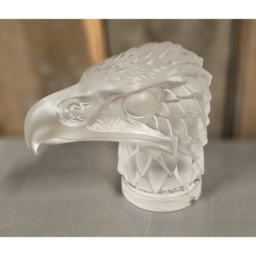 141 - A Lalique style eagles head moulded glass car mascot, impressed Made in Czechoslovakia, 12cm