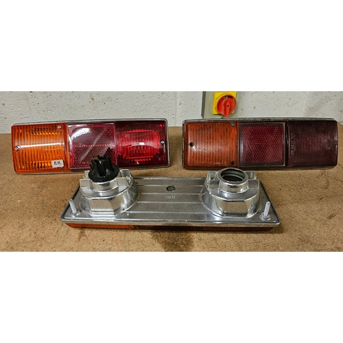 148 - Two Lucas L782 RH rear light units, NOS, and a used example. As fitted to Lotus 7 and Aston Martin D... 