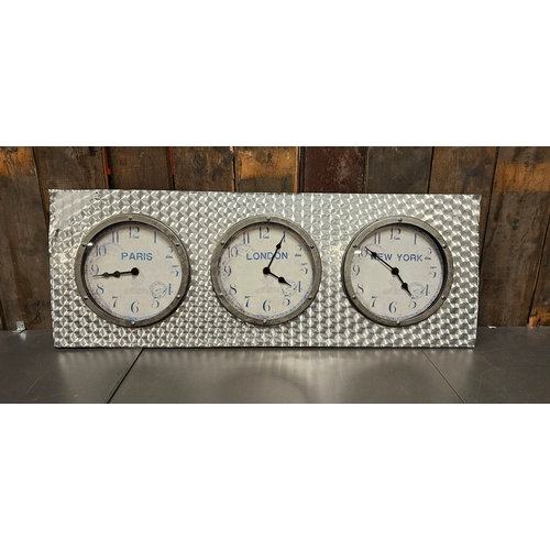 162 - A time zone triple clock panel, London, New York, Paris, quartz movements, simulated turned alloy fr... 