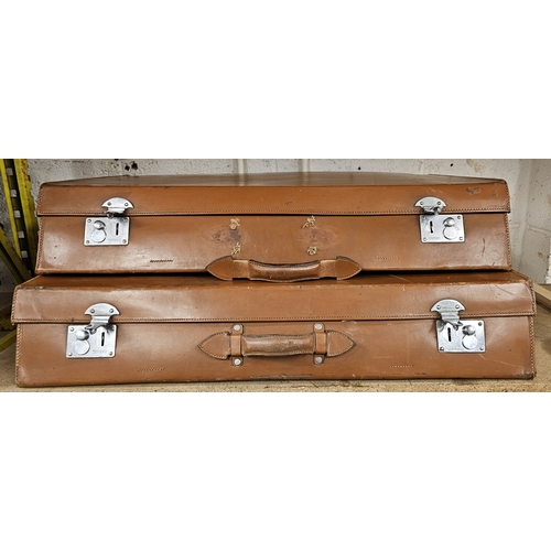 224 - A two piece tan leather trunk set, 82 x 58 x 15cm and 82 x 48 x 15cm (2)