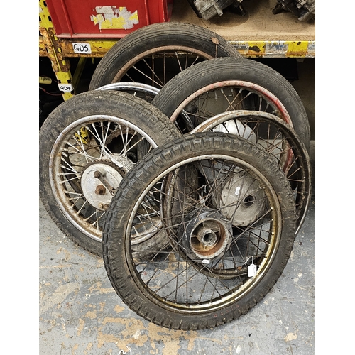 342 - A Triumph Tiger Cub front wheel and 5 other Triumph wheels