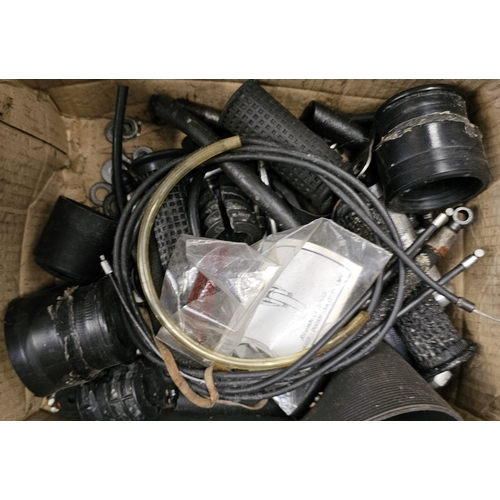 358 - A collection of Moto Guzzi 750 spares, including a NOS starter motor, cylinder heads, cam covers and... 