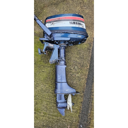 386 - A Yamaha 4hp four stroke outboard engine.