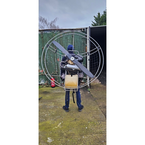 387 - A paramotor with seat, for attachment to a hang glider or similar.
Please note, we have not tested t... 