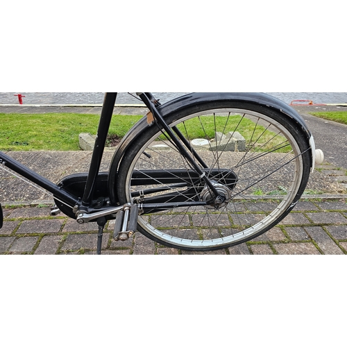 391 - A gentleman's Rudge bicycle with 3 speed Sturmey Archer gears, rod brakes and 26