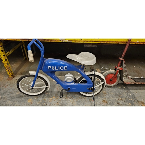 393 - A vintage child's metal tricycle in the form of a motorcycle and a scooter (2)