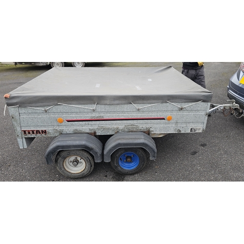 399 - A Titan M7034 twin axle box trailer with cover, approximately 200 x 150cm bed.