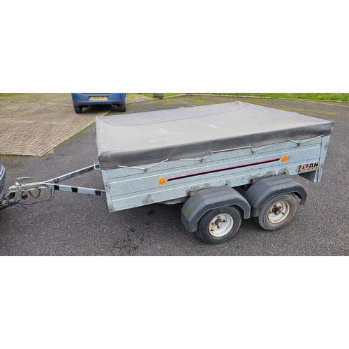 399 - A Titan M7034 twin axle box trailer with cover, approximately 200 x 150cm bed.