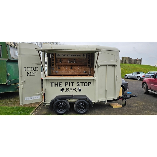 400 - A mobile catering unit/bar, converted from a twin axle horse box, fitted electrical system and water... 