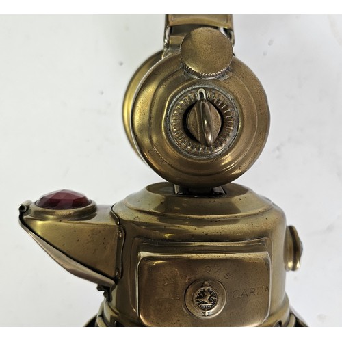 155 - A rare Lucas Garda carbide brass car lamp with side rear red lens