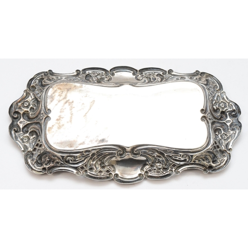 29 - A Victorian silver embossed calling card tray, by George Unite, Birmingham 1876, with pierced decora... 