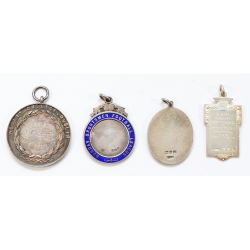 32 - Four silver medallions comprising of, a silver and enamel London Academy of Music Causy Honoris meda... 