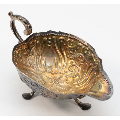 38 - A George III silver embossed sauce boat, London 1770, 10 x 6cm, 49gm.