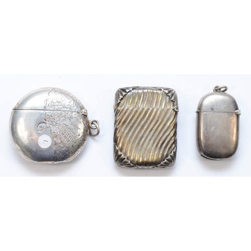 65 - An Edward VII silver circular vesta case, by  Constantine & Floyd Ltd, Birmingham 1902, with chased ... 