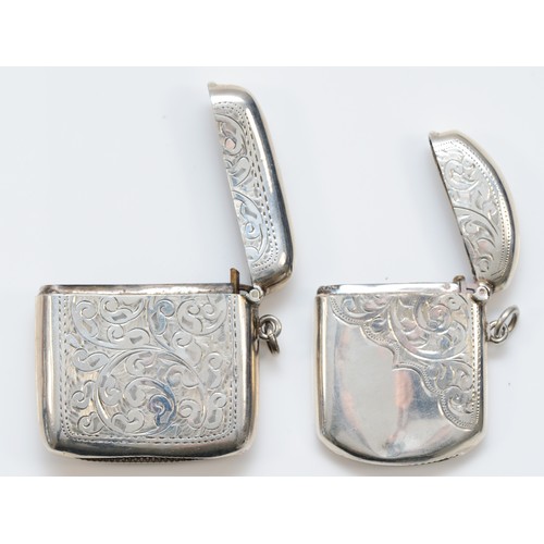 73 - An Edwardian silver rounded square vesta case, Birmingham 1904, together with another vesta, Birming... 