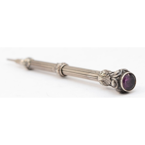 93 - An early 20th century silver bodied propelling pencil, by S. Mordan& Co, purple paste stone finial, ... 