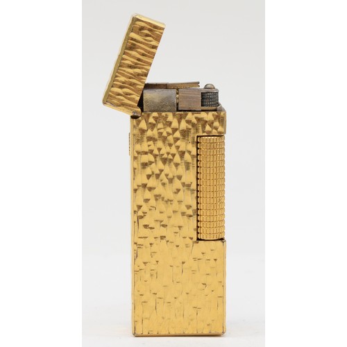 99 - Dunhill, a gold plated rectangular gas lighter, US.RE24163, 6.5 x 2.5cm.