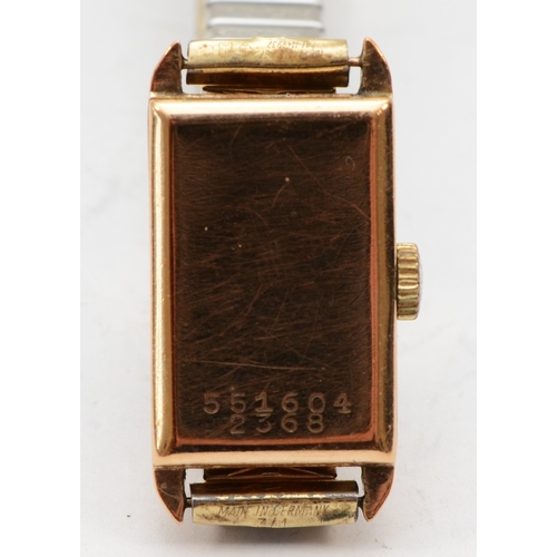 112 - Rolco, A 9ct gold cased rectangular Ladies wrist watch, the silvered dial set with Arabic numerals, ... 