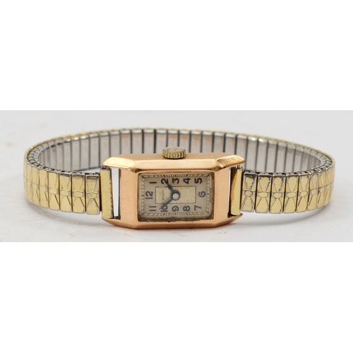 112 - Rolco, A 9ct gold cased rectangular Ladies wrist watch, the silvered dial set with Arabic numerals, ... 