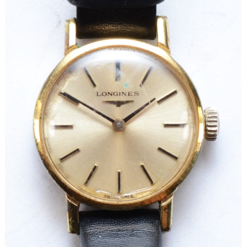 113 - Longines, a gold plated Ladies wrist watch, set with baton numerals, seventeen unadjusted movement, ... 