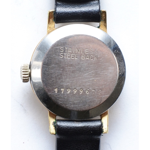 113 - Longines, a gold plated Ladies wrist watch, set with baton numerals, seventeen unadjusted movement, ... 