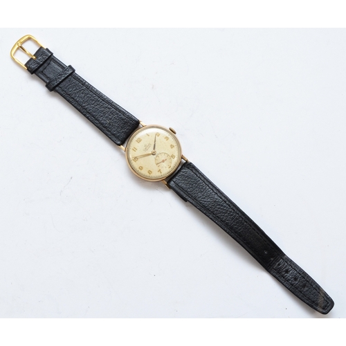 115 - Smiths De Luxe, a 9ct gold cased Gentleman's wrist watch, the dial set with Arabic numerals and seco... 