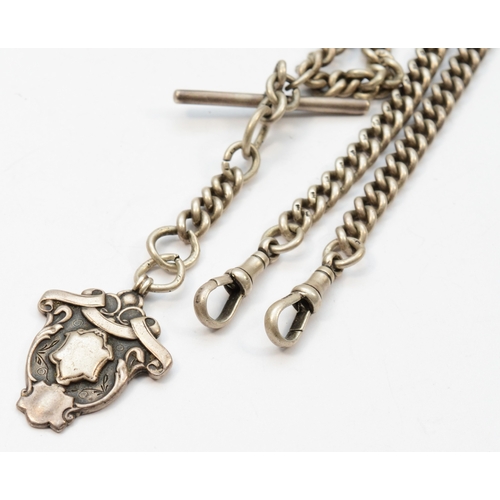 137 - A George V silver curb link t-bar pocket watch chain, by Herbert Bushell, Birmingham 1916, with a si... 