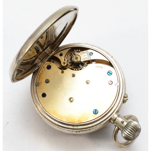 158 - A nickel plated eight day Goliath key less wind pocket watch, the enamel dial set with Roman numeral... 